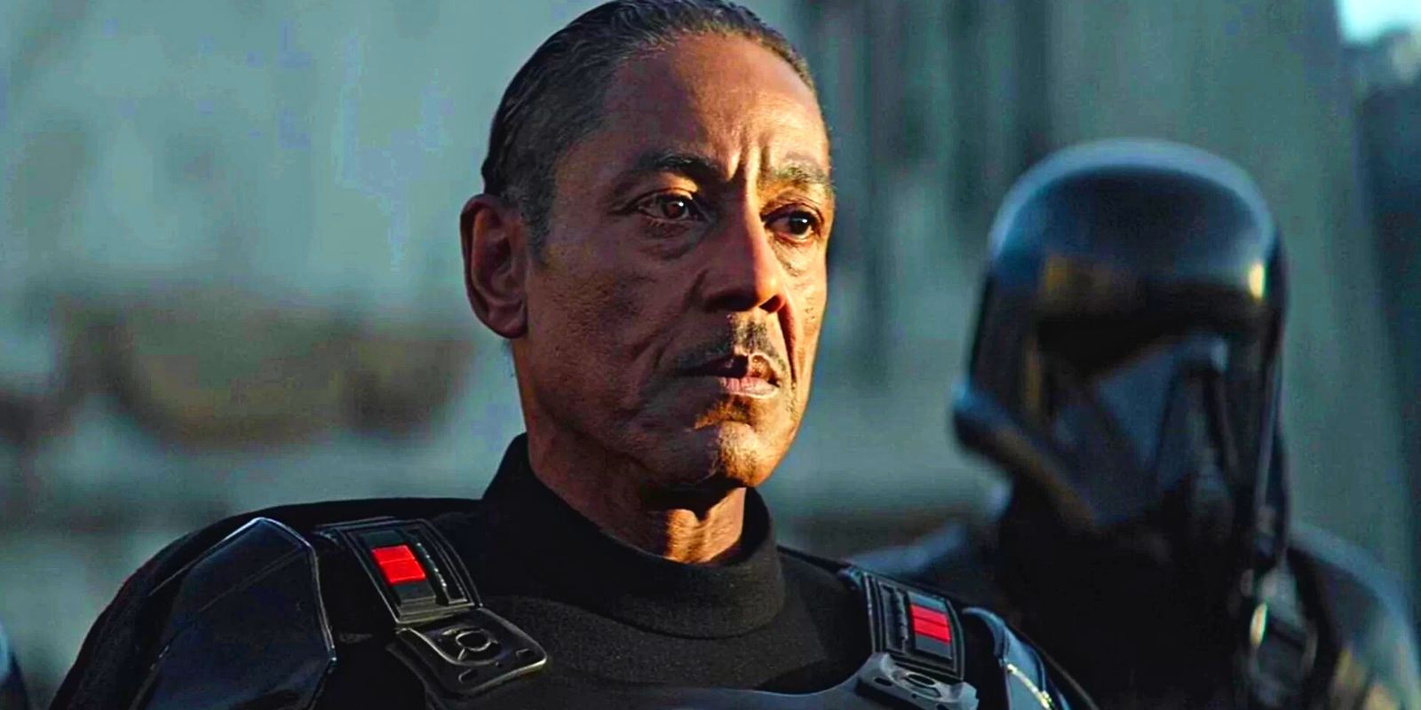 Moff Gideon glaring with a Death Trooper behind him