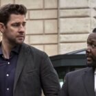 (L to R) John Krasinski (as Jack Ryan) and Wendell Pierce (as James Greer) look at each other on the street in Jack Ryan season 3
