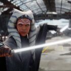 Rosario Dawson as Ahsoka Tano, holding two lightsabers, in the Ahsoka trailer