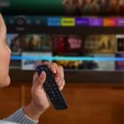 Women Holding Fire TV Remote