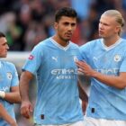 Rodri of Manchester City is consoled by teammate Erling Haaland ahead of the UEFA Super Cup Man City vs Sevilla live stream. 