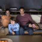 Family watching TV