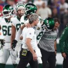 Aaron Rodgers Carried Off Field With Injury During First Career Jets Drive