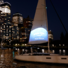 Image: A view of Amazon Prime Video logo projected on a sail at a reception for Season 2 of "Modern...