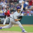 Los Angeles Dodgers starting pitcher Clayton Kershaw throws in the first inning against the Cleveland Guardians