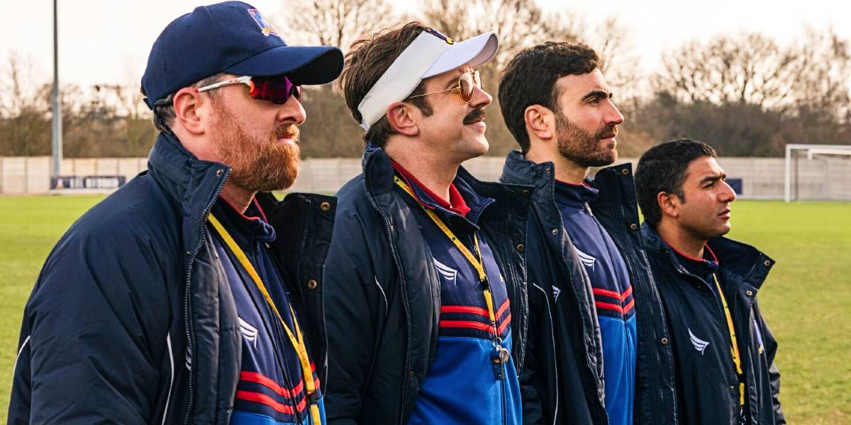 Ted Lasso cast standing in row