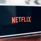 The logo of Netflix appears on a smartphone. (Photo via Wikimedia Commons)