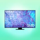 A Samsung Q80C series smart TV against a green background.