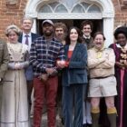 The cast of Ghosts outside of Button House