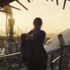 A silhouetted Lucy emerges from Vault 33 in Prime Video