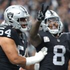 Josh Jacobs #8 of the Las Vegas Raiders celebrates with Netane Muti #54 ahead of the Raiders vs Dolphins live stream
