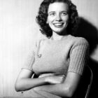 Country singer songwriter June Carter Cash sits backstage at the Grand Ole Opry circa 1951 in Nashville, Tennessee.