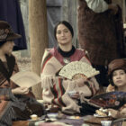 JaNae Collins, from left, Lily Gladstone and Cara Jade Myers in a scene from "Killers of the Flower Moon." (Melinda Sue Gordon/Apple TV+)