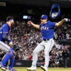 Texas Rangers catcher Jonah Heim, left, and relief pitcher Josh Sborz celebrate after Game 5 of the baseball World Series against the Arizona Diamondbacks Wednesday, Nov. 1, 2023, in Phoenix. The Rangers won 5-0 to win the series 4-1. (AP Photo/Godofredo A. Vásquez)