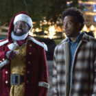This image released by Disney+ shows Lil Rel Howery as Nick, left, and Chris &ldquo;Ludacris&rdquo; Bridges as Eddie in a scene from the holiday special &ldquo;Dashing Through the Snow.&rdquo; (Steve Dietl/Disney+ via AP) (Stephanie Mei-Ling/Universal Pictures/Peacock)