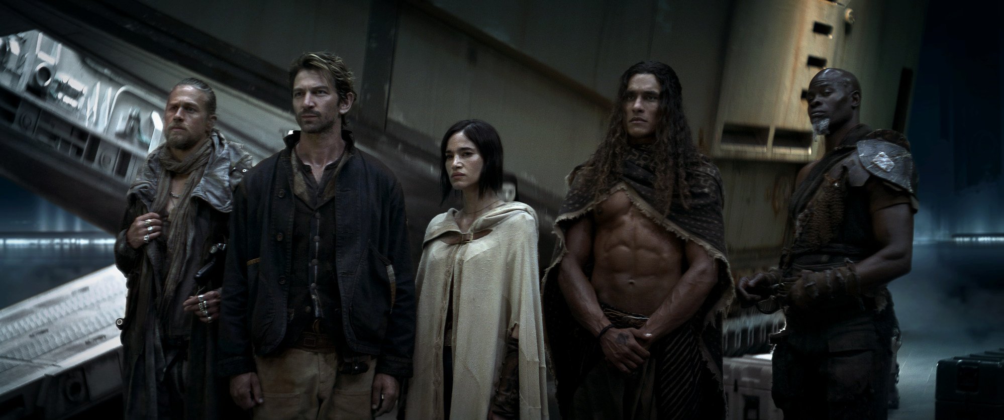 (From left) Charlie Hunnam as Kai, Michiel Huisman as Gunnar, Sofia Boutella as Kora, Staz Nair as Tarak and Djimon Hounsou as Titus in a still from “Rebel Moon – Part One: A Child of Fire”. Photo: Clay Enos/Netflix