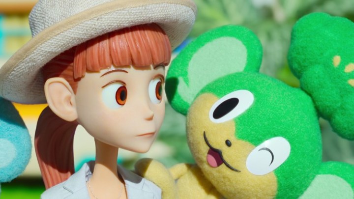 Haru stands next to Pansage in Pokemon Concierge.