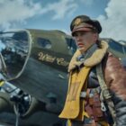 Austin Butler stands in front of a massive bomber in 'Masters of the Air.'
