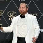 US actor Paul Walter Hauser poses in the press room with the Outstanding Supporting Actor in a Limited/Anthology Series or Movie award for 