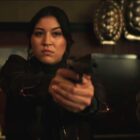 Alaqua Cox aiming a gun in anger in Echo.