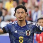 Takumi Minamino of Japan celebrates prior to the Iraq vs Japan live stream at the AFC Asian Cup