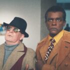 Tom Hollander as Truman Capote and Chris Chalk as James Baldwin in 