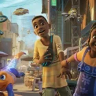 A girl runs with her arm stretched out in the Disney+ series Iwájú