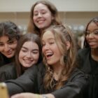 This is an image of a group of young women taking a group selfie in the documentary film &ldquo;Girls State