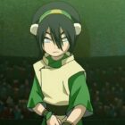 Toph stands in a fighting stance in a dimly lit arena in Avatar: The Last Airbender