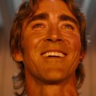 A close up of Brother Day smiling while bathed in sunlight in Foundation season 2
