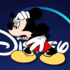 Worried Mickey with Disney+ logo in background
