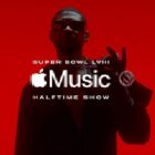 Silhouette of musician Usher against a red background with Apple Music logo in front