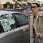 Celeste Flores-Narvaez, sister of Deborah Flores Narvaez, talks to a reporter in a shopping cen ...