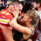 Travis Kelce and Taylor Swift kissing at the 2024 Super Bowl