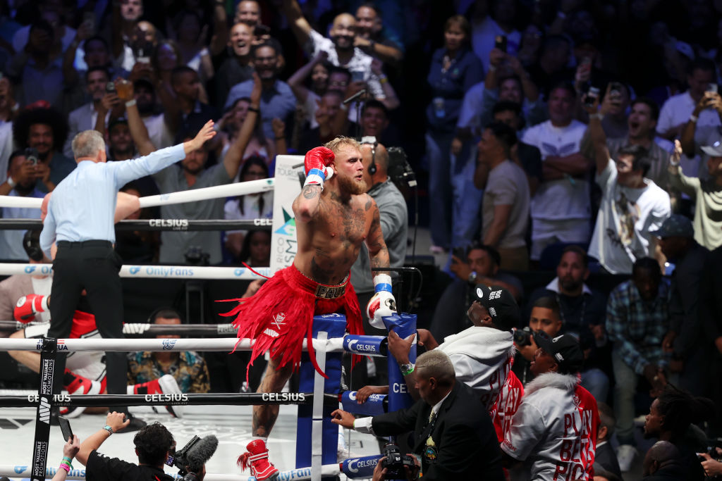 Jake Paul celebrates after defeating Ryan Bourland