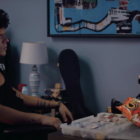 A still from the trailer for the upcoming Prime Video movie Musica in which actor and internet star Rudy Mancuso is sat opposite a puppet.