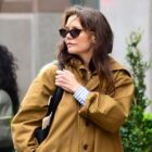 Katie Holmes's Mustard-Brown Trench Is the Perfect Coat for Waiting Out Summer