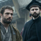 Cosmo Jarvis as John Blackthorne, Tommy Bastow as Father Martin Alvito in 