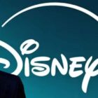 Bob iger, the ceo of disney, with a focused expression, superimposed on a blue background next to the disney+ logo in white.