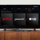 netflix peacock and apple tv plus logos on tv screen