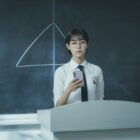 Pyramid Game promo image featuring a student standing in front of a pyramid drawing