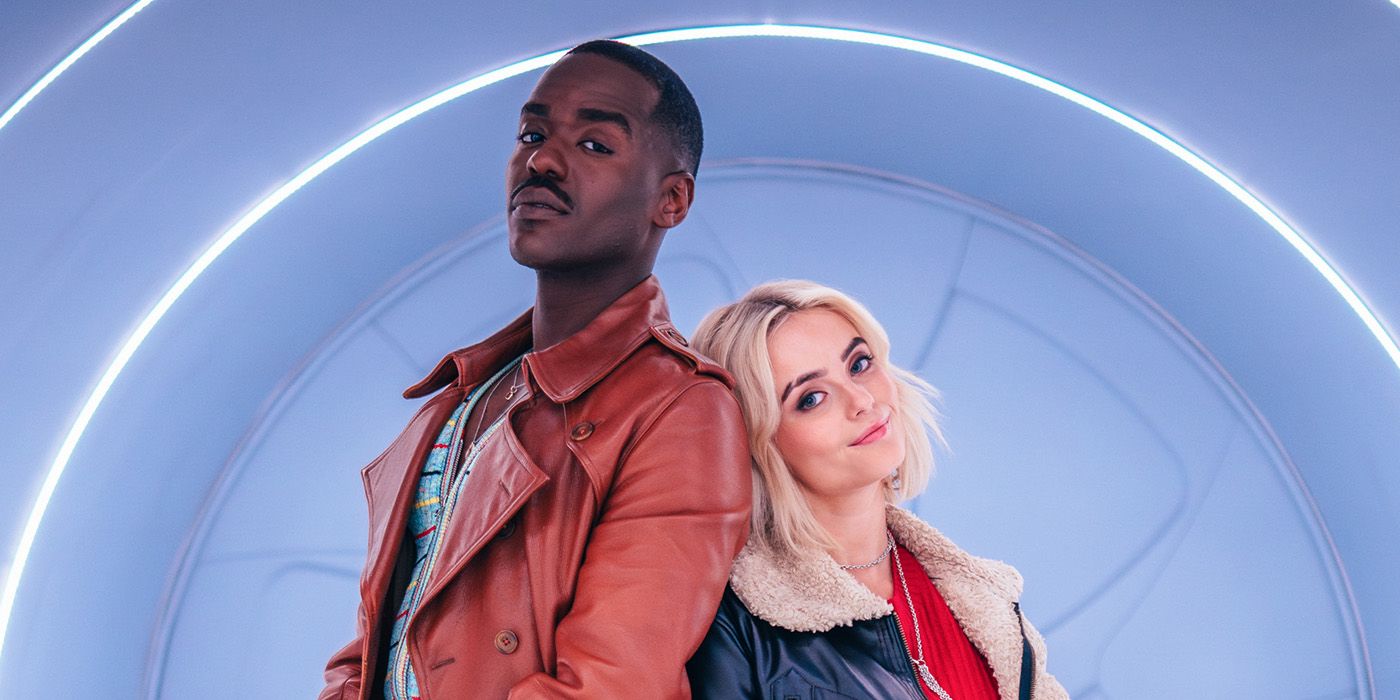 The Doctor and Ruby Sunday leaning against each other and looking at the camera in Doctor Who