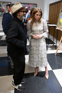 LONDON, ENGLAND - JULY 01: Mr. Brainwash and Princess Beatrice of York attend the presentation of Mr. Brainwash by Clarendon Fine Art and Jack Barclay Bentley at Jack Barclay Bentley on July 01, 2024 in London, England. (Photo by Kate Green/Getty Images)