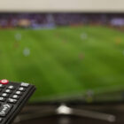 Remote and Soccer game on TV