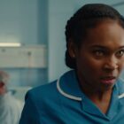 Sabrina (Nadine Mills) in a nurse uniform in the hospital in Netflix
