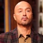Judge Joe Bastianich appearing stoic while judging Masterchef.