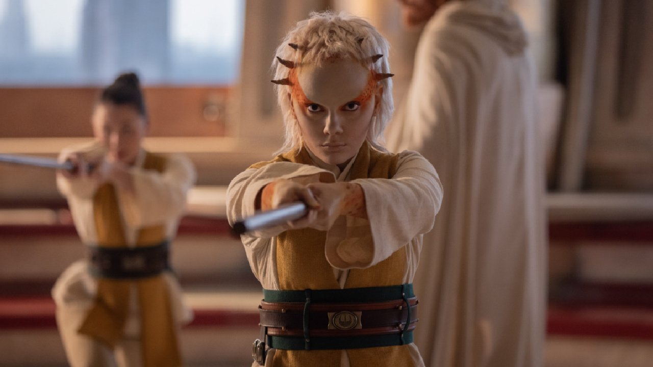 (Center to right) Jedi Padawan Jecki Lon (Dafne Keen) and Master Lakshay (Paul Bullion) in Lucasfilm's 'The Acolyte'