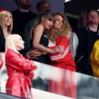 LAS VEGAS, NEVADA - FEBRUARY 11: Rapper Ice Spice, Singer Taylor Swift and Actress Blake Lively hug prior to Super Bowl LVIII between the San Francisco 49ers and Kansas City Chiefs at Allegiant Stadium on February 11, 2024 in Las Vegas, Nevada. (Photo by Ezra Shaw/Getty Images)