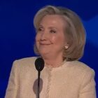 Hillary Clinton Smiles During 'Lock Him Up' Chant Against Trump at DNC