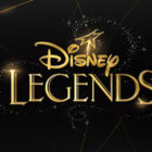 Gold lettering on a dark background with a star graphic and sparkles. Text reads "Disney Legends.